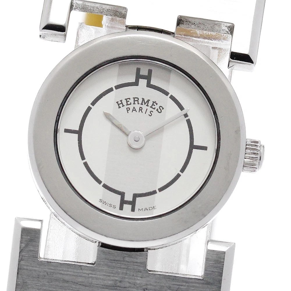 HERMES PAPRIKA SILVER QUARTZ WATCH: HERMES paprika Silver Quartz Watch Brand: HERMES Type/Style: Wristwatch Material: Band Material leather, Case Material Stainless Steel Color: Band Color yellow, Dial Color Silver, Case Color Silver