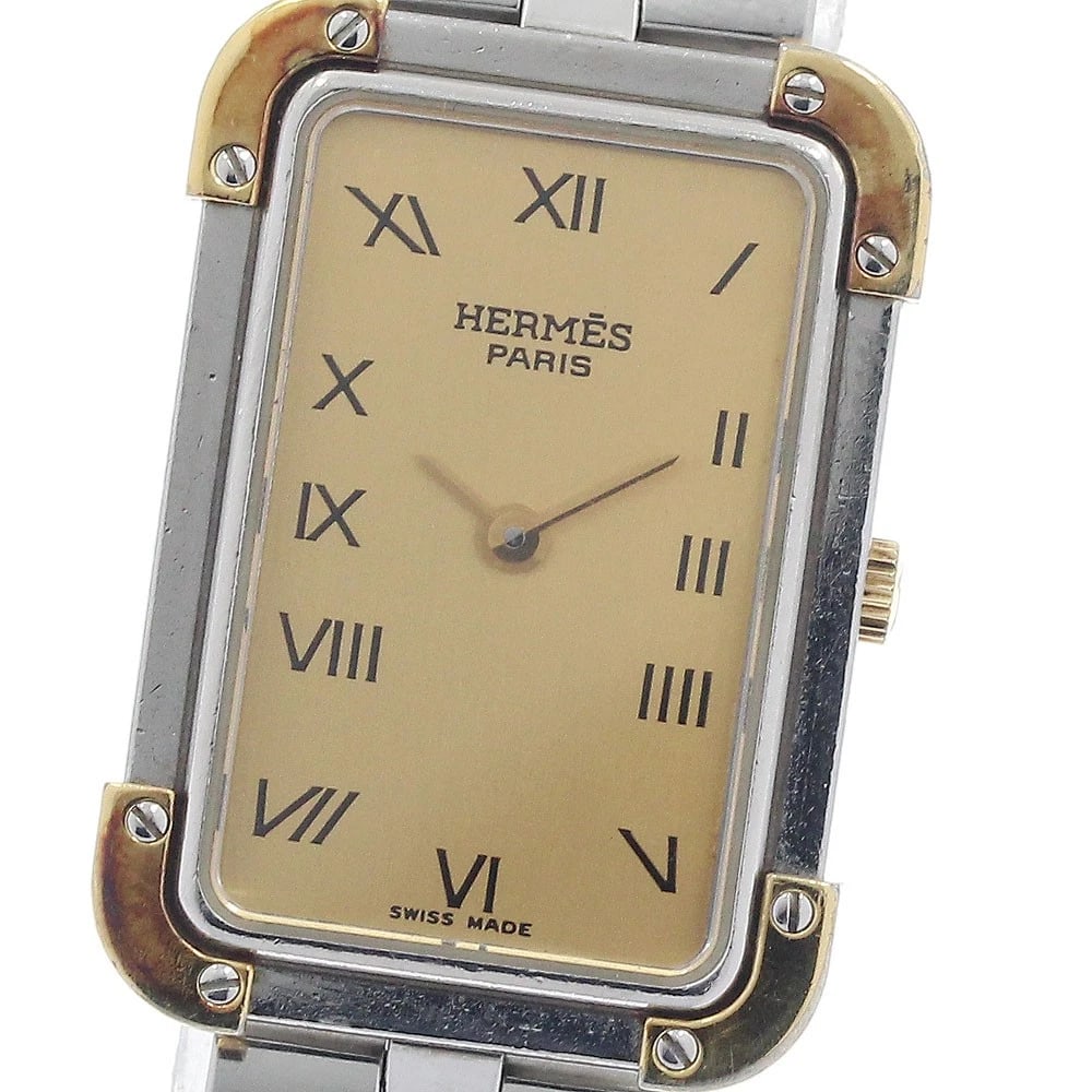 HERMES GOLD QUARTZ WATCH: HERMES gold Quartz Watch Brand: HERMES Type/Style: Wristwatch Material: Band Material Stainless Steel/Gold Plated, Case Material Stainless Steel/Gold Plated Color: Band Color Silver / Gold, Dial
