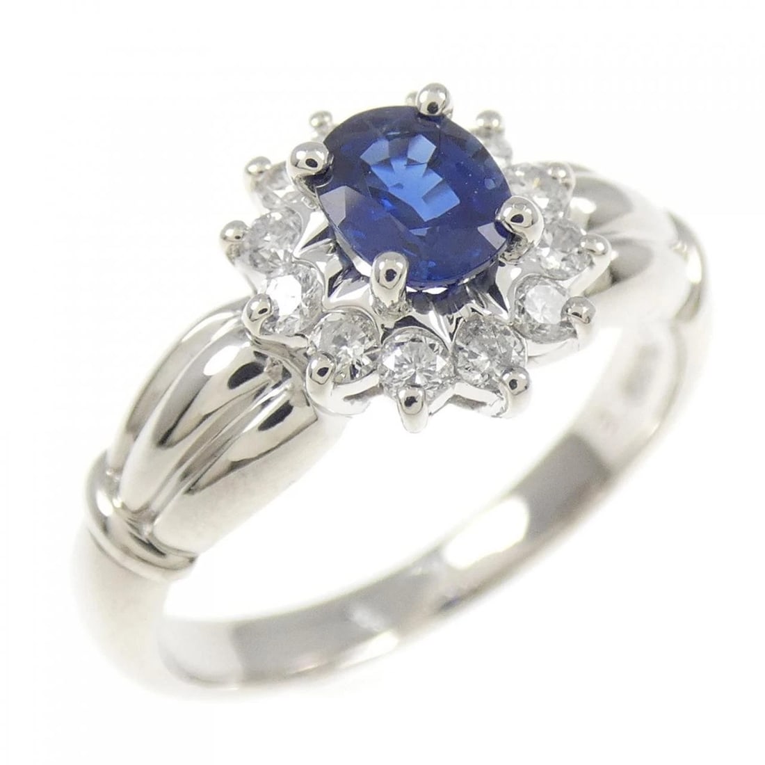 PT900 SAPPHIRE RING: PT900 Sapphire Ring Brand: Unbranded Type/Style: Sapphire Ring Material: PT900, Main Stone/Creation SapphireSecondary Stone Diamond Color: Silver Size: US 4 3/4 Accessories: None Accessories Notice: