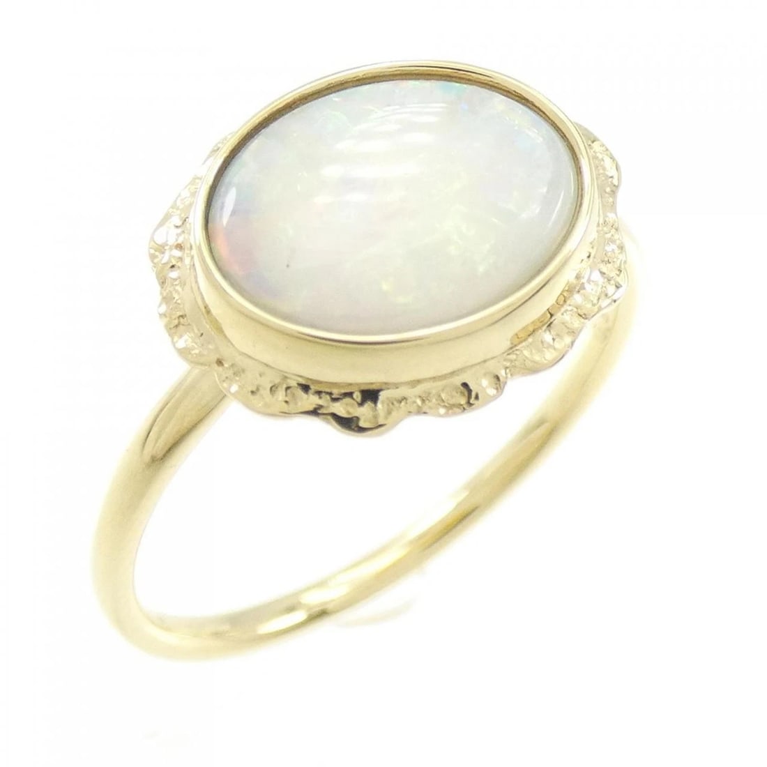 K18YG OPAL RING: K18YG Opal Ring Brand: Unbranded Type/Style: Opal Ring Material: K18YG, Main Stone/Creation Opal Color: YG Size: US 7 Accessories: None Accessories Notice: When purchasing pre-owned goods, please