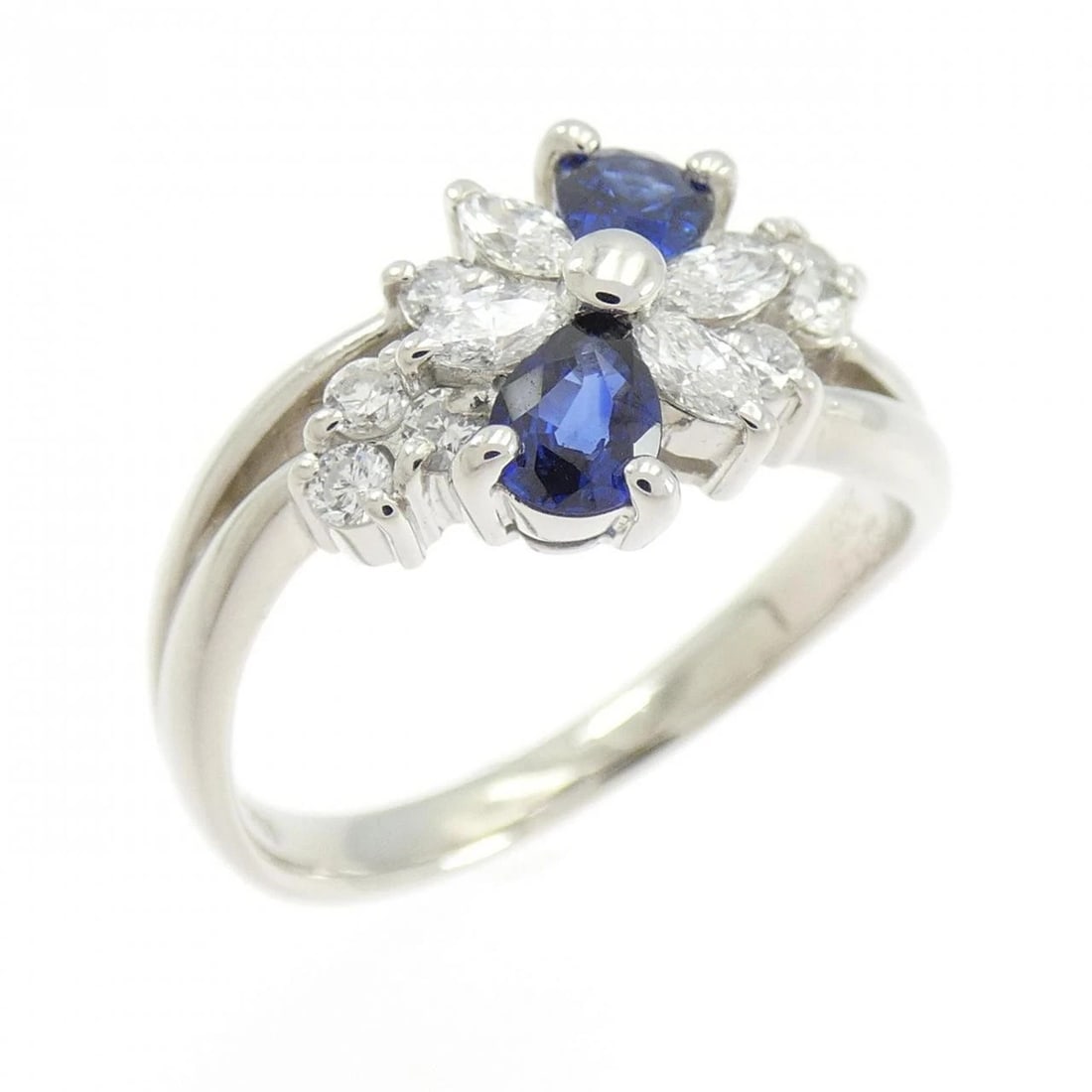 PT900 SAPPHIRE RING: PT900 Sapphire Ring Brand: Unbranded Type/Style: Sapphire Ring Material: PT900, Main Stone/Creation Sapphire Secondary Stone Diamond Color: Silver Size: US 6 1/4 Accessories: None Accessories Notice: