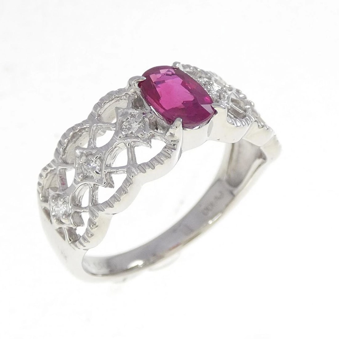 PT900 RUBY RING: PT900 Ruby Ring Brand: Unbranded Type/Style: Ruby Ring Material: PT900, Main Stone/Creation RUBY Secondary Stone Diamond Color: Silver Size: US 6 1/4 Accessories: None Accessories Notice: