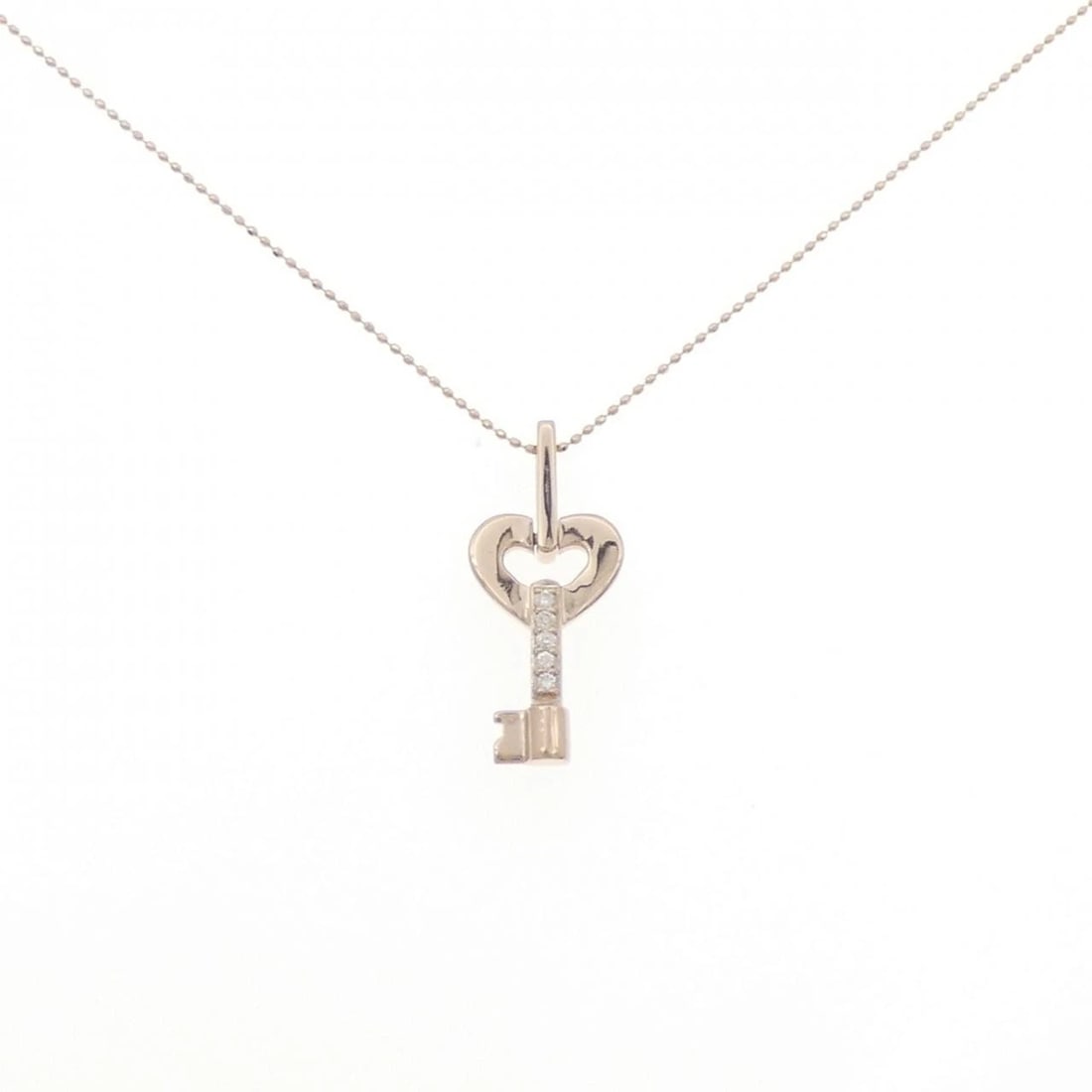 K18PG HEART X KEY DIAMOND NECKLACE: K18PG Heart x Key Diamond Necklace Brand: Unbranded Type/Style: Diamond Necklace Material: K18PG, Main Stone/Creation Natural Color: Pink Gold Size: Actual Size Pendant length approx. x width approx.: