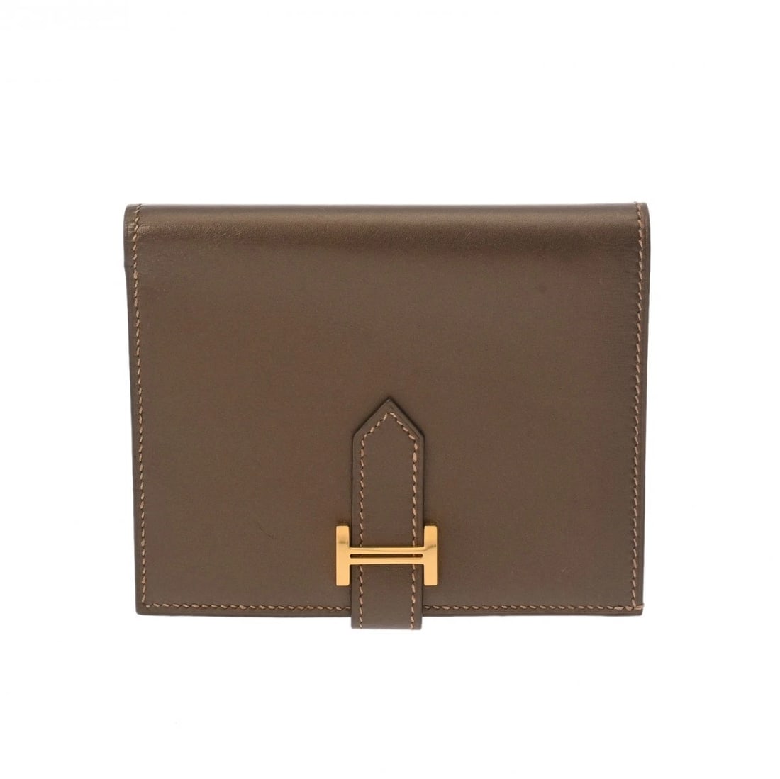 HERMES BEAN COMPACT BRONZE UNISEX BIFOLD WALLET: HERMES Bean compact bronze unisex Bifold Wallet Brand: HERMES Type/Style: Bifold Wallet Material: Vaumelova Color: bronze ? Gold Metal Size: H:about 3.7inch W:about 4.7inch Accessories: None