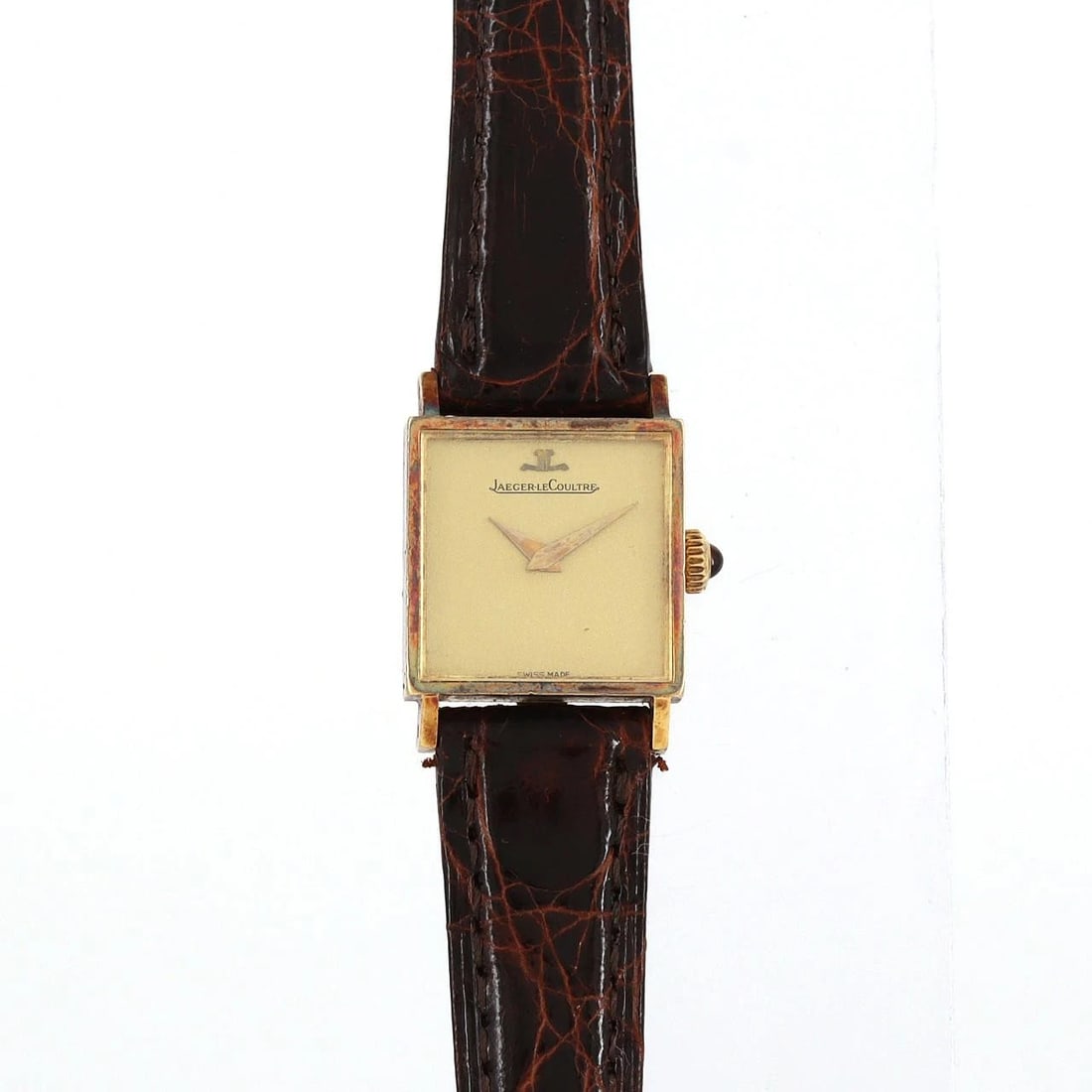 JAEGER-LECOULTRE SQUARE CASE YG WATCH: Jaeger-LeCoultre Square Case YG Watch Brand: JAEGER-LECOULTRE Type/Style: Wrist watch Material: Case: Yellow gold Bracelet: Strap Color: Dial Color: Gold Band color: Brown Size: Case diameter:
