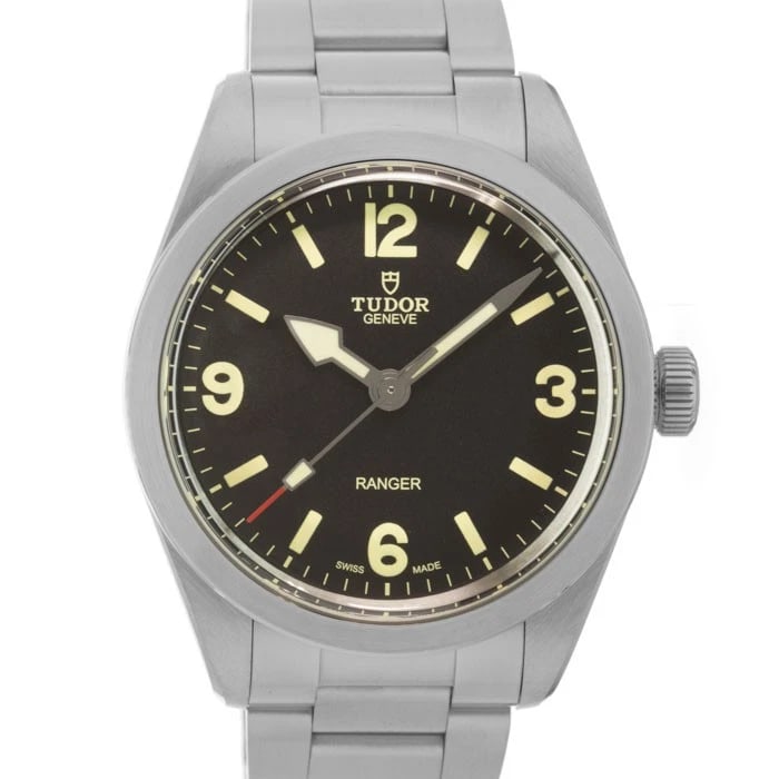 TUDOR RANGER WATCH: TUDOR Ranger Watch Brand: TUDOR Type/Style: Wristwatch Material: Case Material Steel, Band Material Stainless Steel Color: Case Color Silver, Dial color Black, Band Color Silver Size: Case Size 39 mm