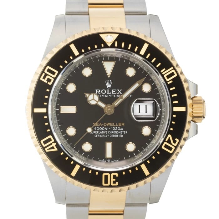 ROLEX SEA DWELLER WATCH: ROLEX Sea Dweller Watch Brand: ROLEX Type/Style: Wristwatch Material: Case Material Stainless Steel/Yellow Gold, Band Material Stainless Steel/Yellow Gold Color: Case Color Silver, Gold, Dial color