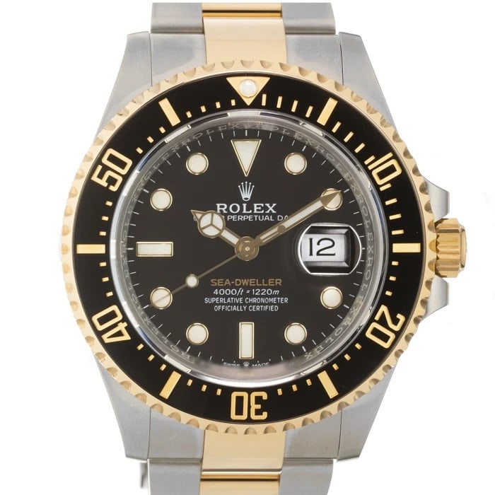 ROLEX SEA DWELLER WATCH: ROLEX Sea Dweller Watch Brand: ROLEX Type/Style: Wristwatch Material: Case Material Stainless Steel/Yellow Gold, Band Material Stainless Steel/Yellow Gold Color: Case Color Silver, Gold, Dial color