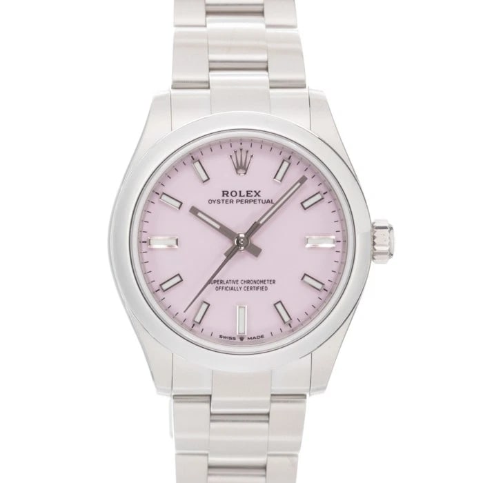 ROLEX OYSTER PERPETUAL CANDY PINK WATCH: ROLEX Oyster Perpetual Candy Pink Watch Brand: ROLEX Type/Style: Wristwatch Material: Case Material Stainless Steel, Band Material Stainless Steel Color: Case Color Silver, Dial color Candy Pink,