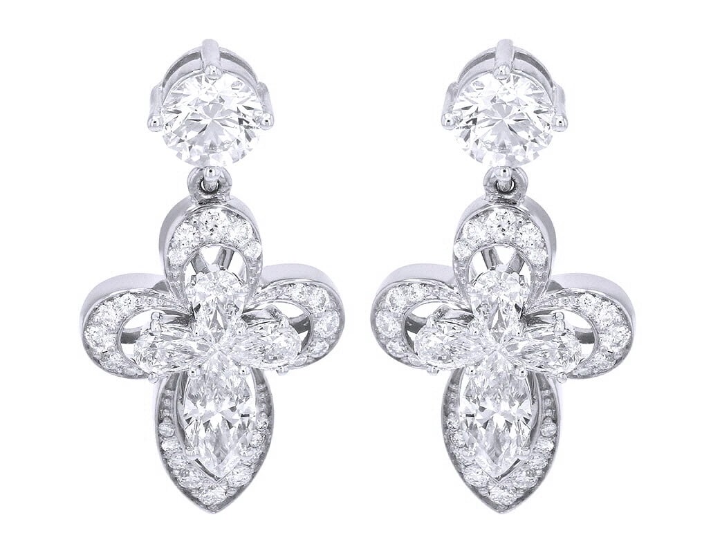 PEAR DIAMOND DROP CROSS EARRINGS: Pear Diamond Drop Cross Earrings Brand: none Type/Style: Earrings Material: 10K , White Gold, Main Stone/Creation White Color: Natural Size: Dimension L 1" x W 13mm Accessories: None Accessories