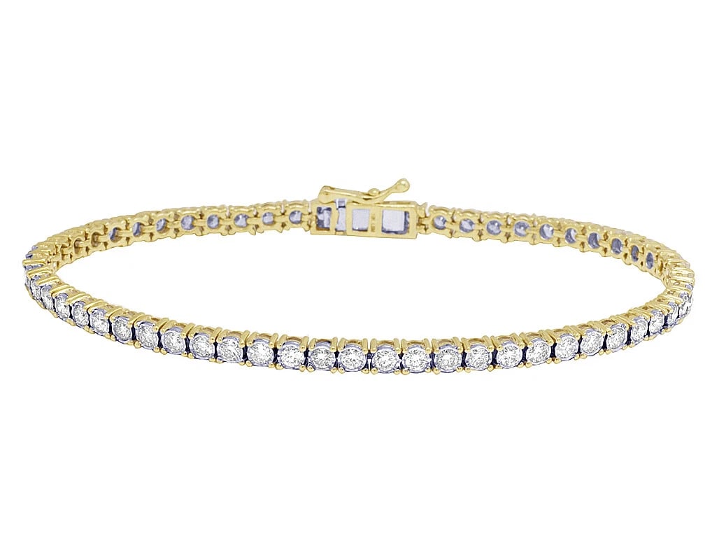 SINGLE ROW ILLUSION SET DIAMOND TENNIS BRACELET: Single Row Illusion Set Diamond Tennis Bracelet Brand: none Type/Style: Bracelet Material: 10K , Yellow Gold, Main Stone/Creation Yellow Color: Natural Size: Length 8 in Width4MM Accessories: None