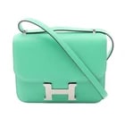 HERMES CONSTANCE 3 MINI VERSO SHOULDER BAG: HERMES Constance 3 Mini Verso Shoulder Bag Brand: HERMES Type/Style: Shoulder Bag Material: Evercolor leather ? leather ? Evercolor leather Color: VertComic / Green?ish colors Size: (H:5.9" x W:7.1")