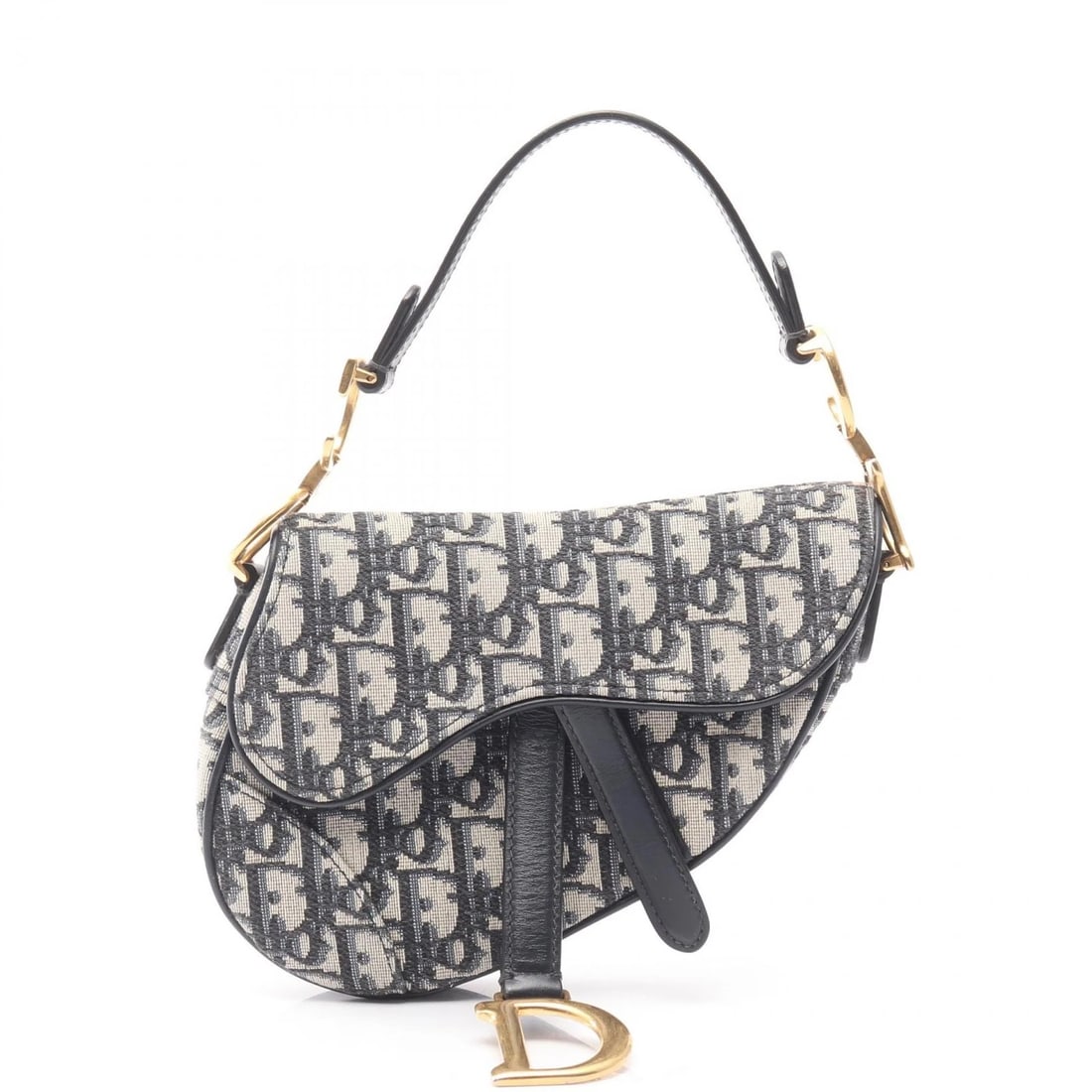 CHRISTIAN DIOR MINI SADDLE OBLIQUE HANDBAG: Christian Dior Mini Saddle Oblique Handbag Brand: Dior Type/Style: Handbag Material: canvas ? leather Color: Beige?ish colors ? Navy?ish colors ? Black?ish colors Size: (H:5.1" x W:7.5" x D:2.4")