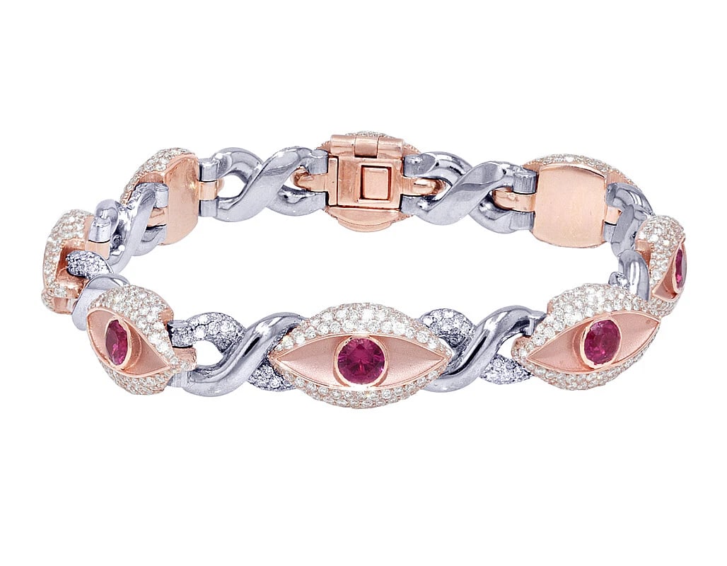 3D EVILEYE DIAMOND INFINITY SYNTHETIC PINK STONE BRACELET: 3D EvilEye Diamond Infinity Synthetic Pink Stone Bracelet Brand: none Type/Style: Bracelet Material: 10k, Rose Gold, Main Stone/Creation Rose Gold Color: Natural Size: Dimension L 8" x W 12mm