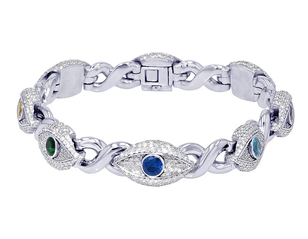 EVILEYE DIAMOND INFINITY RAINBOW SYNTHETIC STONES BRACELET: EvilEye Diamond Infinity Rainbow Synthetic Stones Bracelet Brand: none Type/Style: Bracelet Material: 10k, White Gold, Main Stone/Creation White Color: Natural Size: Dimension L 8" x W 12mm