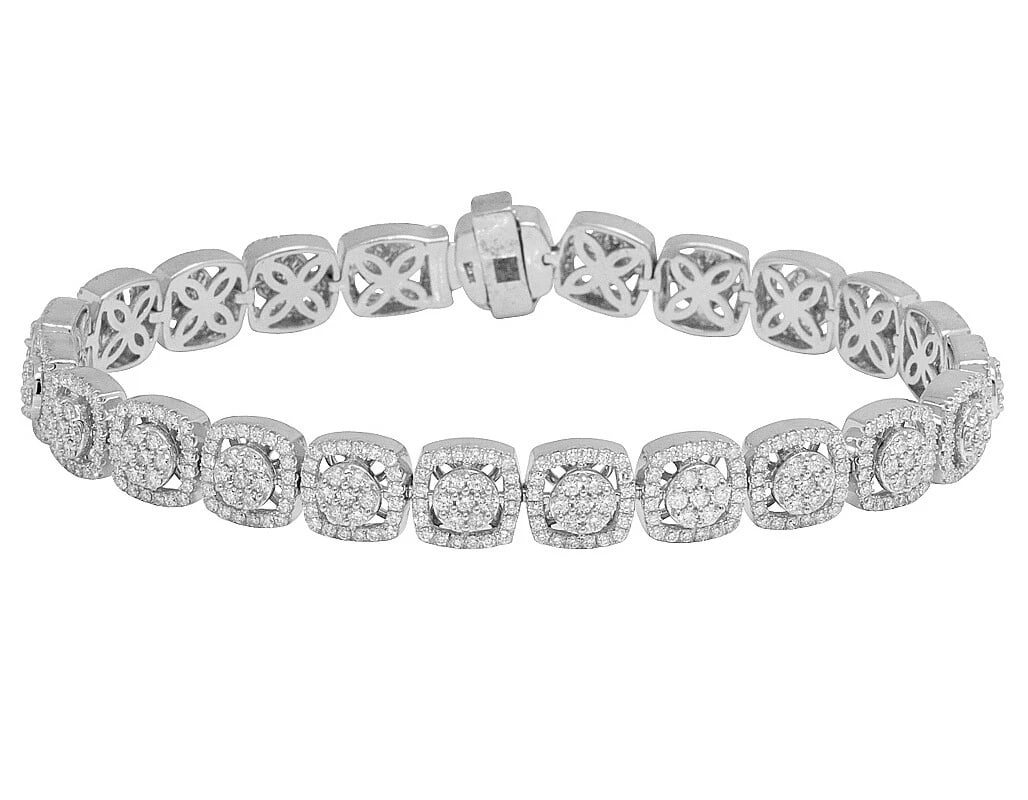 WHITE GOLD FLOWER CLUSTER DIAMOND HALO BRACELET: White Gold Flower Cluster Diamond Halo Bracelet Brand: none Type/Style: Bracelet Material: 10k, White Gold, Main Stone/Creation White Color: Natural Size: L 8.75" x w 9.5mm Accessories: None