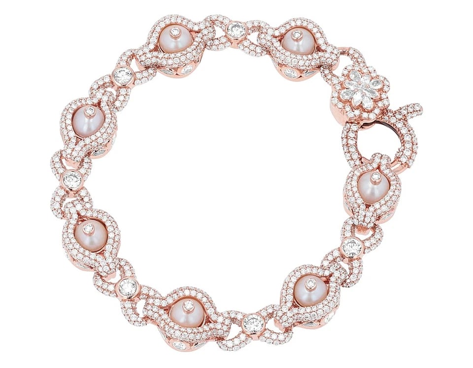 INFINITY DIAMONDS WITH PEARLS 3D BRACELET 10K ROSE GOLD: Infinity Diamonds With Pearls 3D Bracelet 10K Rose Gold Brand: none Type/Style: Bracelet Material: 10K , Rose Gold, Main Stone/Creation Rose Gold Color: Natural Size: Dimension L7.5" W11.5mm Acces