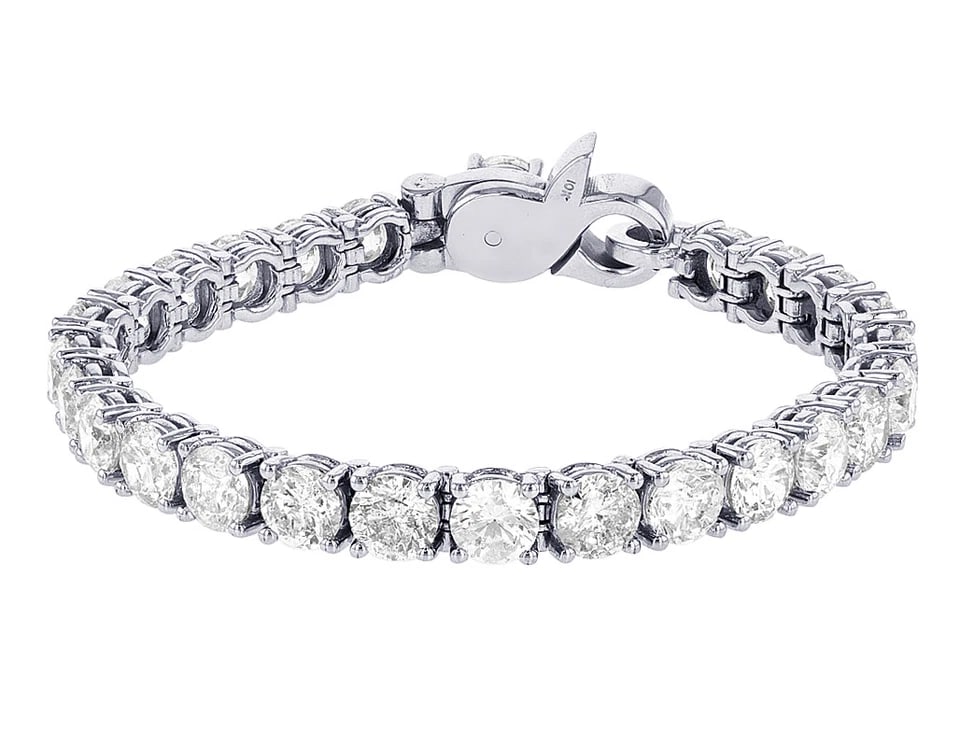 SOLITAIRES DIAMOND 10K WHITE GOLD: Solitaires Diamond 10K White Gold Brand: none Type/Style: Bracelet Material: 10K , White Gold, Main Stone/Creation White Color: Natural Size: Dimension L7.5" W6.5mm Accessories: None Acces