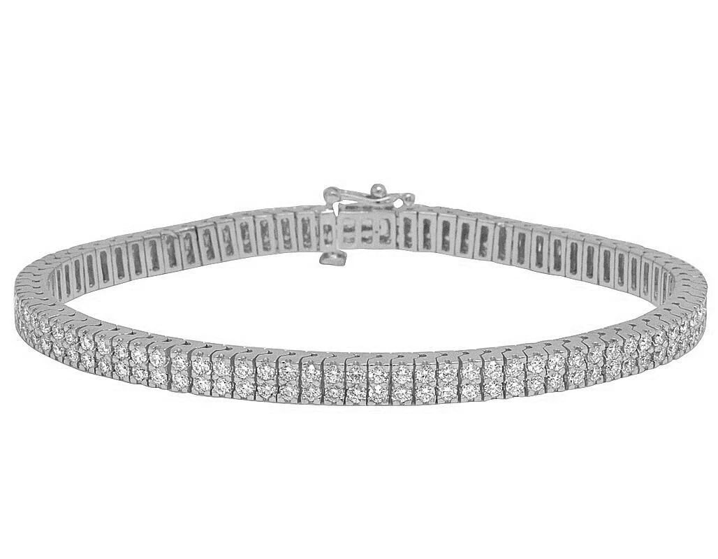 WHITE GOLD 2 ROW TENNIS DIAMOND 3 POINTER 4 PRONG SET BRACELET: White Gold 2 Row Tennis Diamond 3 Pointer 4 Prong Set Bracelet Brand: none Type/Style: Bracelet Material: 10k, White Gold, Main Stone/Creation White Gold Color: Natural Size: Length 8 in Width 5MM