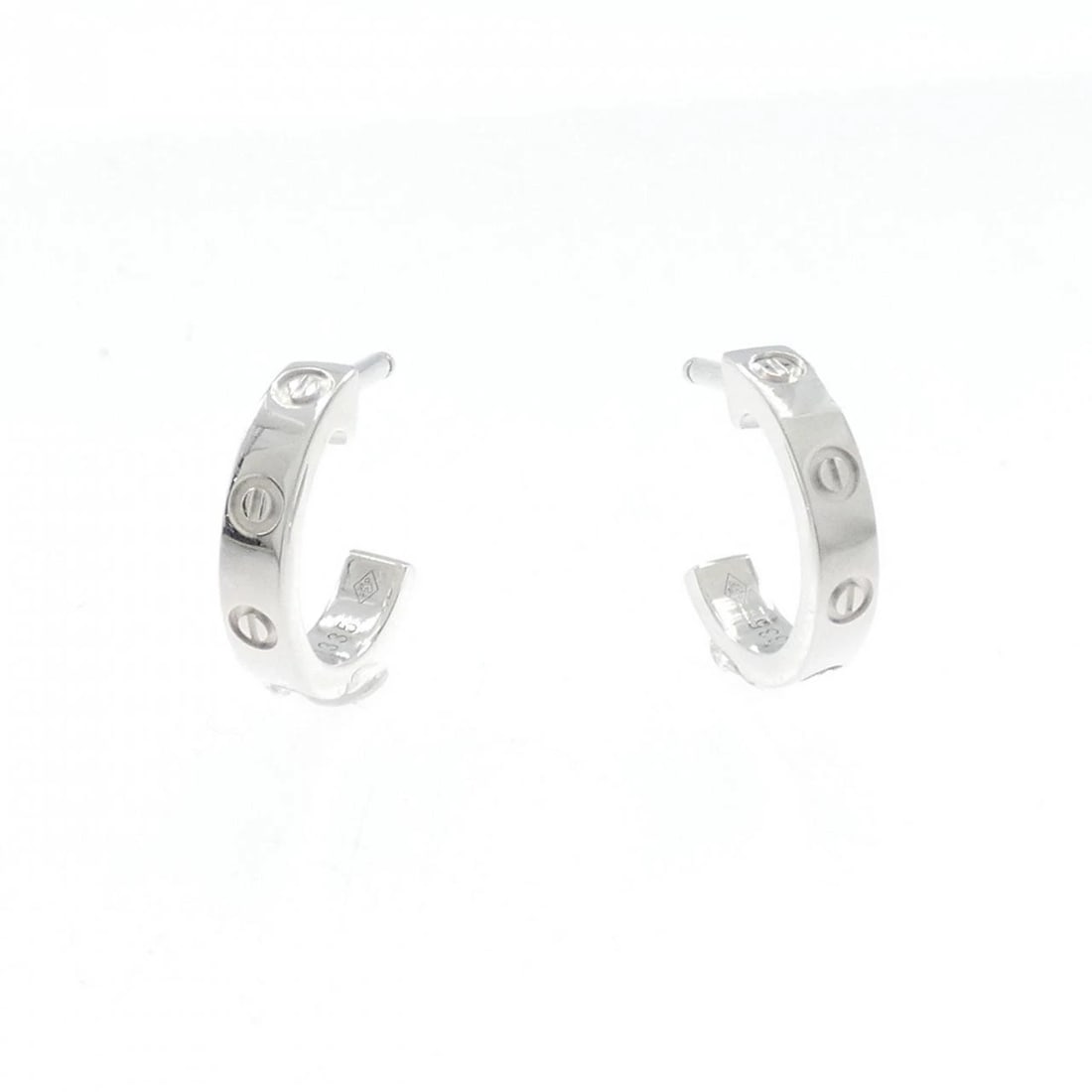 CARTIER MINI LOVE PIERCE: Cartier Mini Love Pierce Brand: CARTIER Type/Style: Cartier Pierce/Earring Material: 750 white gold, Color: White Gold Size: Actual Size Approx. height x width: 12.7mm x 2.6mm Accessories: None