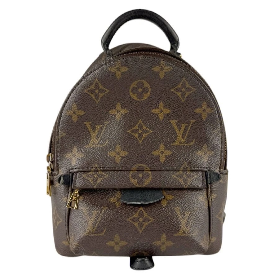 LOUIS VUITTON MONOGRAM PALM SPRINGS MINI BACKPACK: LOUIS VUITTON Monogram Palm Springs MINI Backpack Brand: LOUIS VUITTON Type/Style: Backpack Material: Monogram Canvas Color: Brown Size: Size [inch] W:5.9inx H:8.7inx D:3.1in Handle Length:5.5in Size 