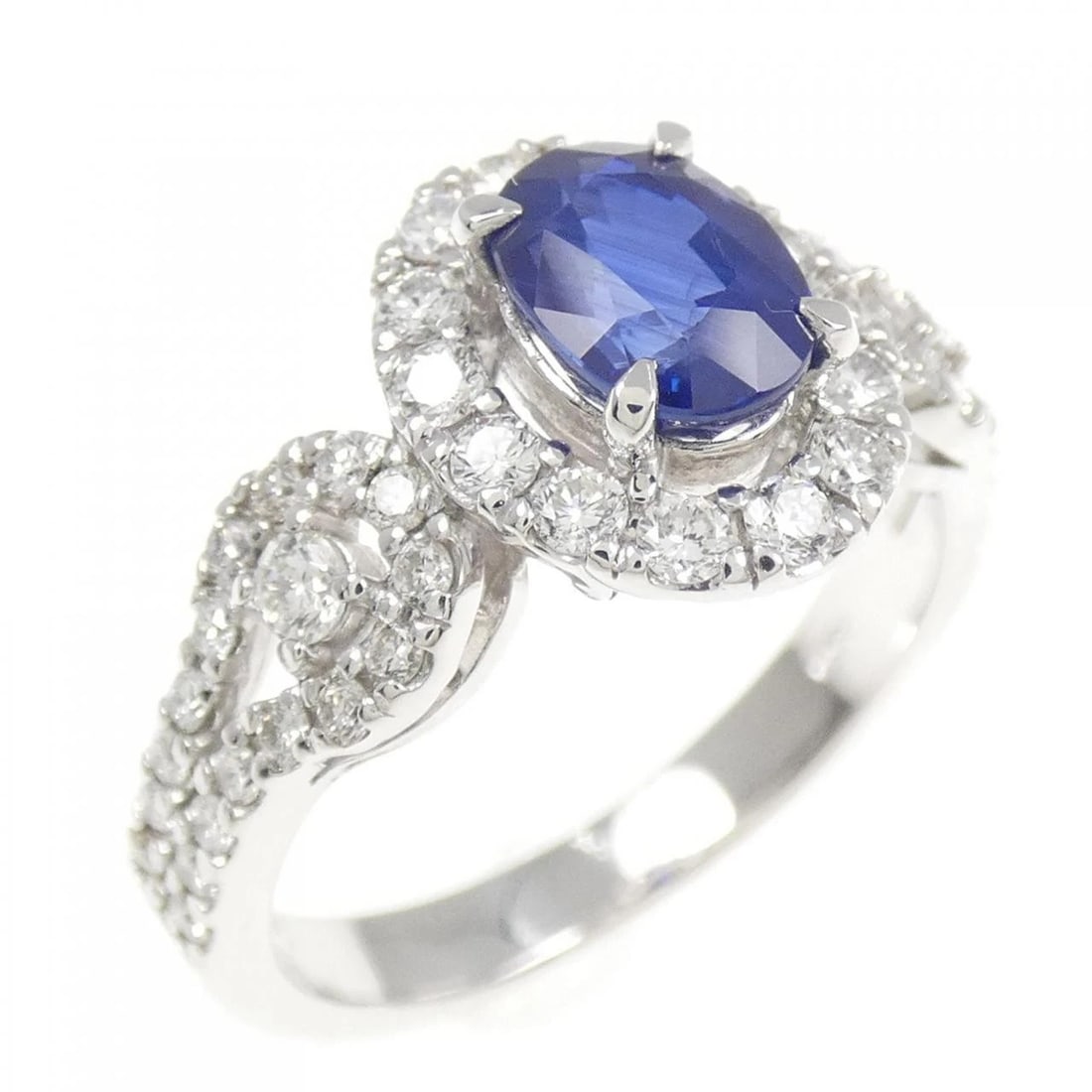 PT900 SAPPHIRE RING: PT900 Sapphire Ring Brand: Unbranded Type/Style: Sapphire Ring Material: PT900, Main Stone/Creation Sapphire Secondary Stone Diamond Color: Silver Size: US 6 1/4 Accessories: None Accessories Notice:
