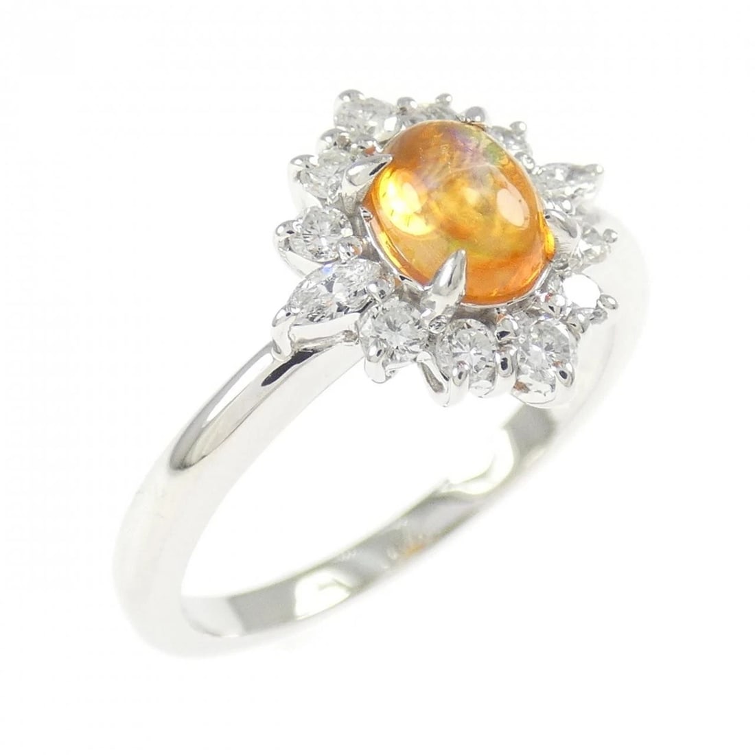 PT900 OPAL RING: PT900 Opal Ring Brand: Unbranded Type/Style: Opal Ring Material: Platinum900, Main Stone/Creation Opal Secondary Stone Diamond Color: Platinum Size: US 6 1/4 Accessories: None Accessories Notice: