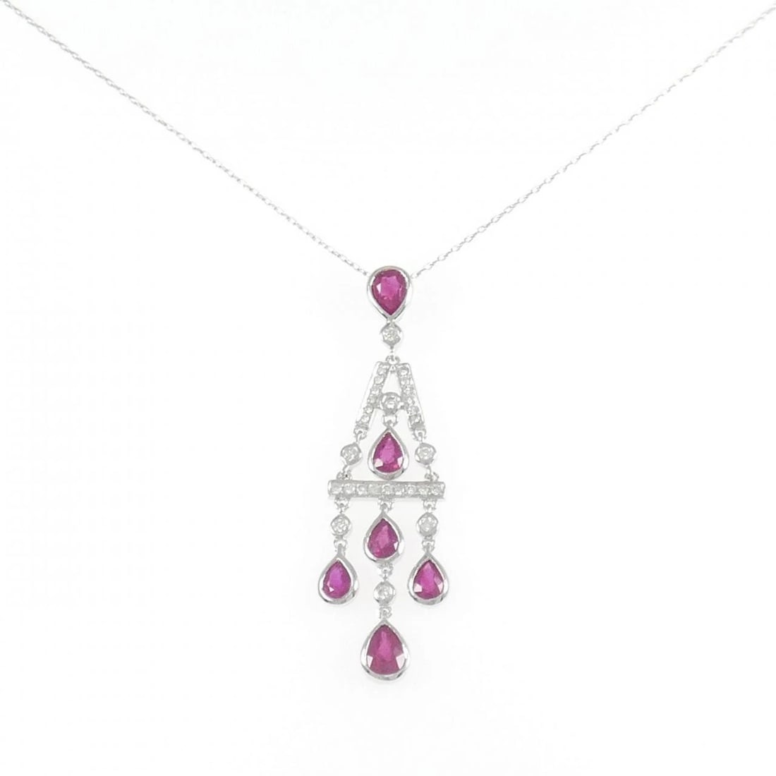 750WG/K18WG RUBY NECKLACE: 750WG/K18WG Ruby Necklace Brand: Unbranded Type/Style: Ruby Necklace Material: 750WG/K18WG, Main Stone/Creation RUBY Secondary Stone Diamond Color: White Gold Size: 45CM Actual Size Pendant length