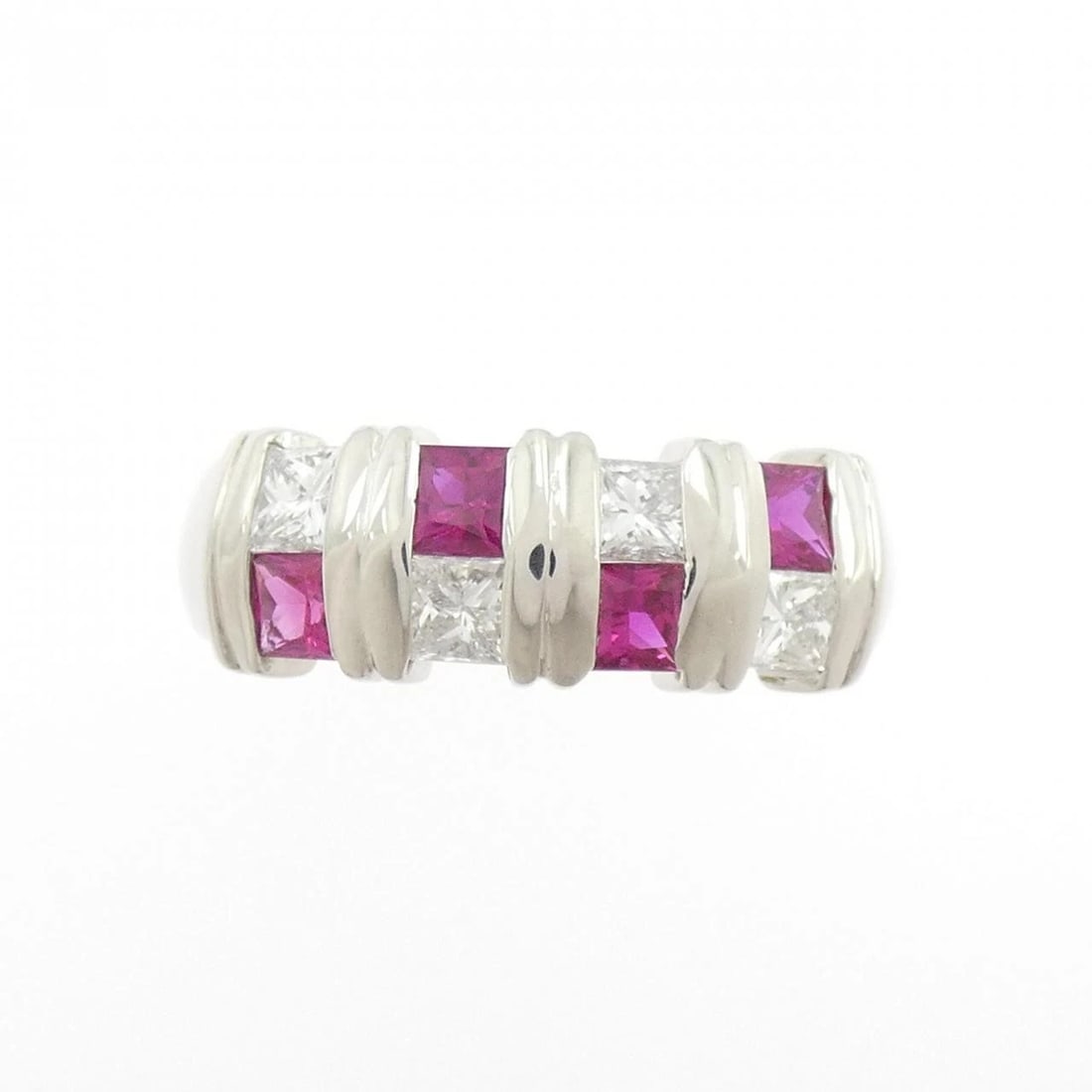 PT900 RUBY RING: PT900 Ruby Ring Brand: Unbranded Type/Style: Ruby Ring Material: PT900, Main Stone/Creation RubySecondary Stone Diamond Color: Silver Size: US 6 Accessories: None Accessories Notice: When purchasing