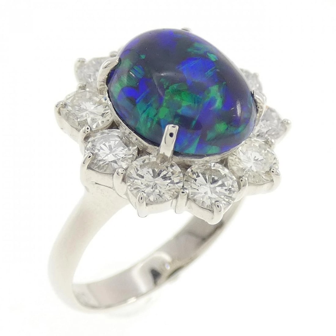 PT900 BLACK OPAL RING: PT900 Black Opal Ring Brand: Unbranded Type/Style: Black Opal Ring Material: PT900, Main Stone/Creation Black OpalSecondaryStoneDiamond Color: Silver Size: US 6 Accessories: None Accessories Notice: