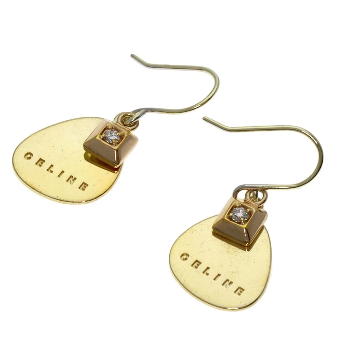 CELINE CELINE DIAMOND LOGO EARRING SILVER: CELINE Celine Diamond Logo earring Silver Brand: CELINE Type/Style: earring Material: Silver, Main Stone/Creation Natural Color: Gold Size: Top Size:0.6inch/14.6x11.3x0.5mm Length:0.9inch/2.4cm Ac