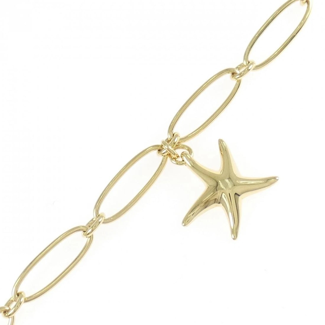 TIFFANY & CO. STARFISH BRACELET: TIFFANY & Co. Starfish Bracelet Brand: TIFFANY&Co. Type/Style: Bracelet Material: 750 yellow gold, Color: yellow gold Size: Max width approx: 22.4mm Size 18.5cm Weight approx. 7.5g Accessories: None