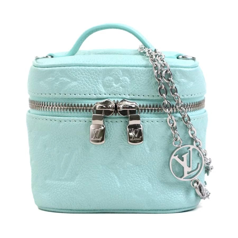 LOUIS VUITTON EMPREINTE MICRO VANITY HANDBAG: LOUIS VUITTON Empreinte Micro Vanity Handbag Brand: LOUIS VUITTON Type/Style: Handbag Material: Monogram Empreinte Leather Color: Light Blue Size: Size [inch] W:4.3inx H:3.9inx D:2.8in Handle