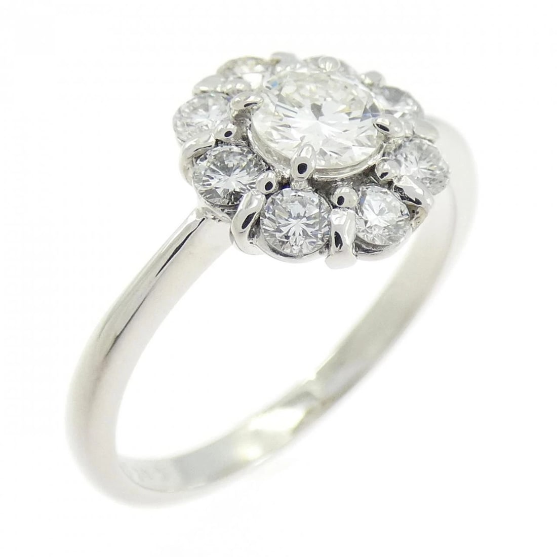 PT900 FLOWER DIAMOND RING: PT900 Flower Diamond Ring Brand: Unbranded Type/Style: Diamond Ring Material: PT900, Main Stone/Creation Natural Color: Silver Size: US 6 Accessories: None Accessories Notice: When purchasing