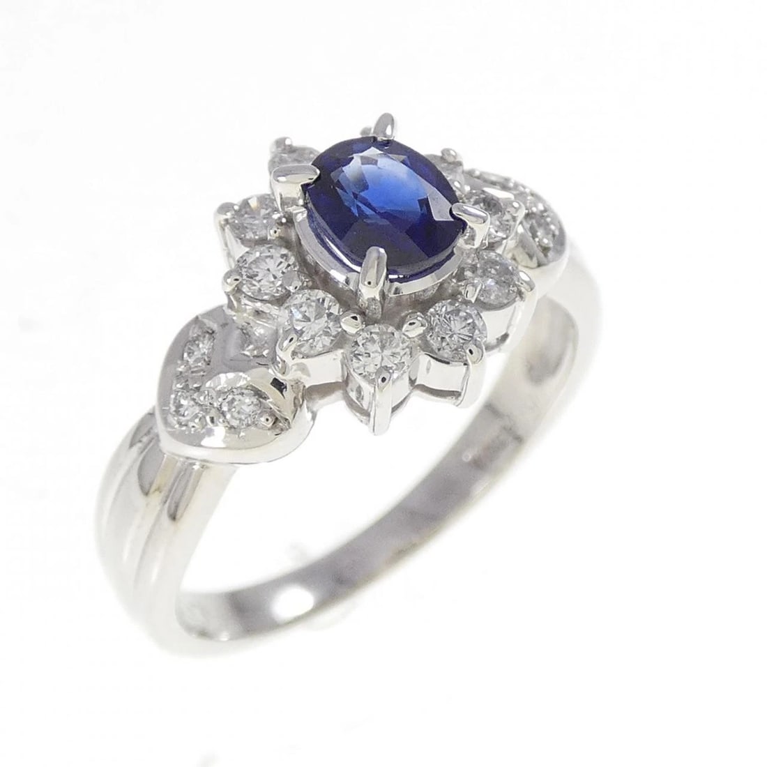 PT900 SAPPHIRE RING: PT900 Sapphire Ring Brand: Unbranded Type/Style: Sapphire Ring Material: PT900, Main Stone/Creation Sapphire Secondary Stone Diamond Color: Silver Size: US 6 1/2 Accessories: None Accessories Notice: