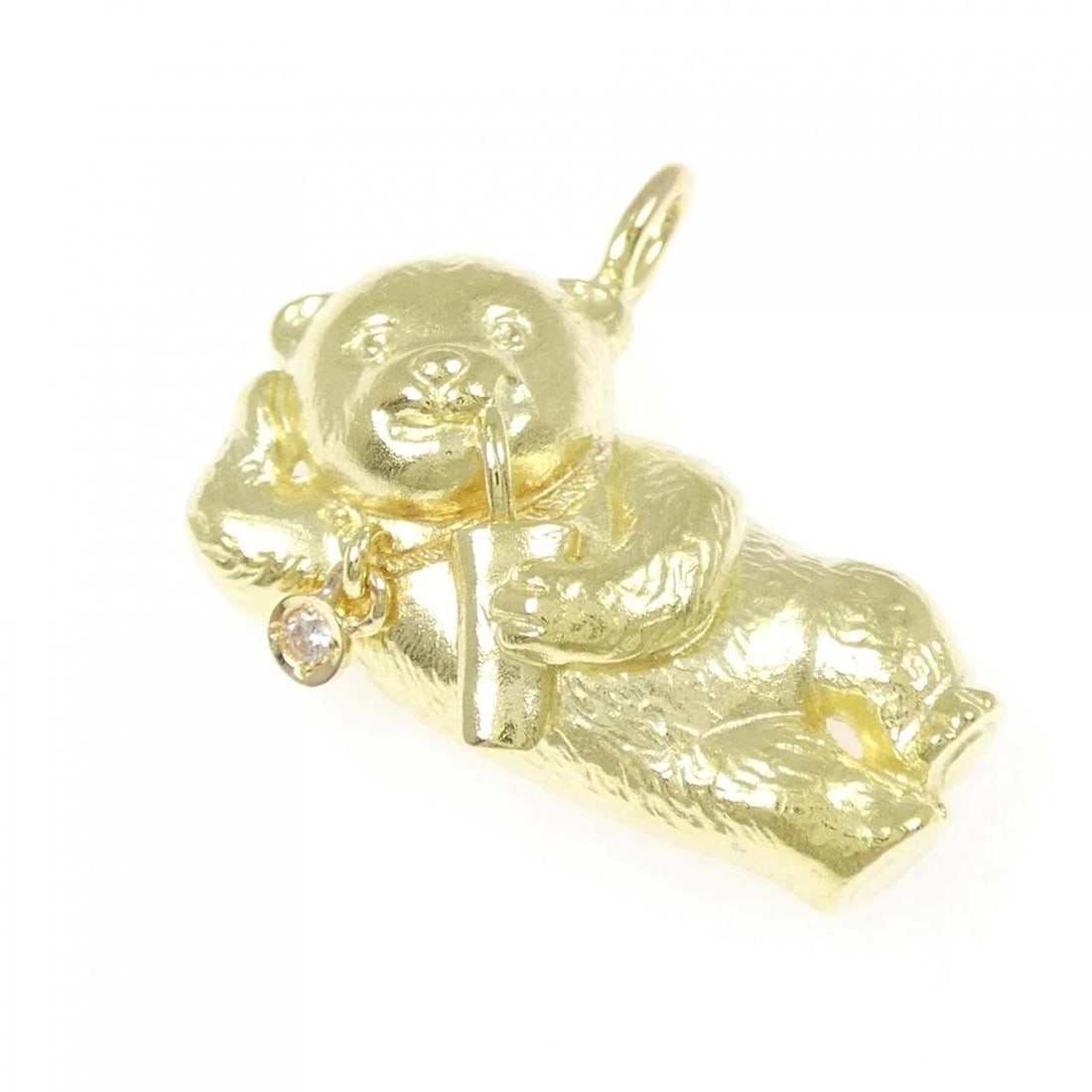 K18YG BEAR DIAMOND PENDANT: K18YG Bear Diamond Pendant Brand: Unbranded Type/Style: Diamond Pendant/Brooch Material: K18YG, Main Stone/Creation Natural Color: Yellow gold Size: Actual Size Approx. length x width: 23.5mm x