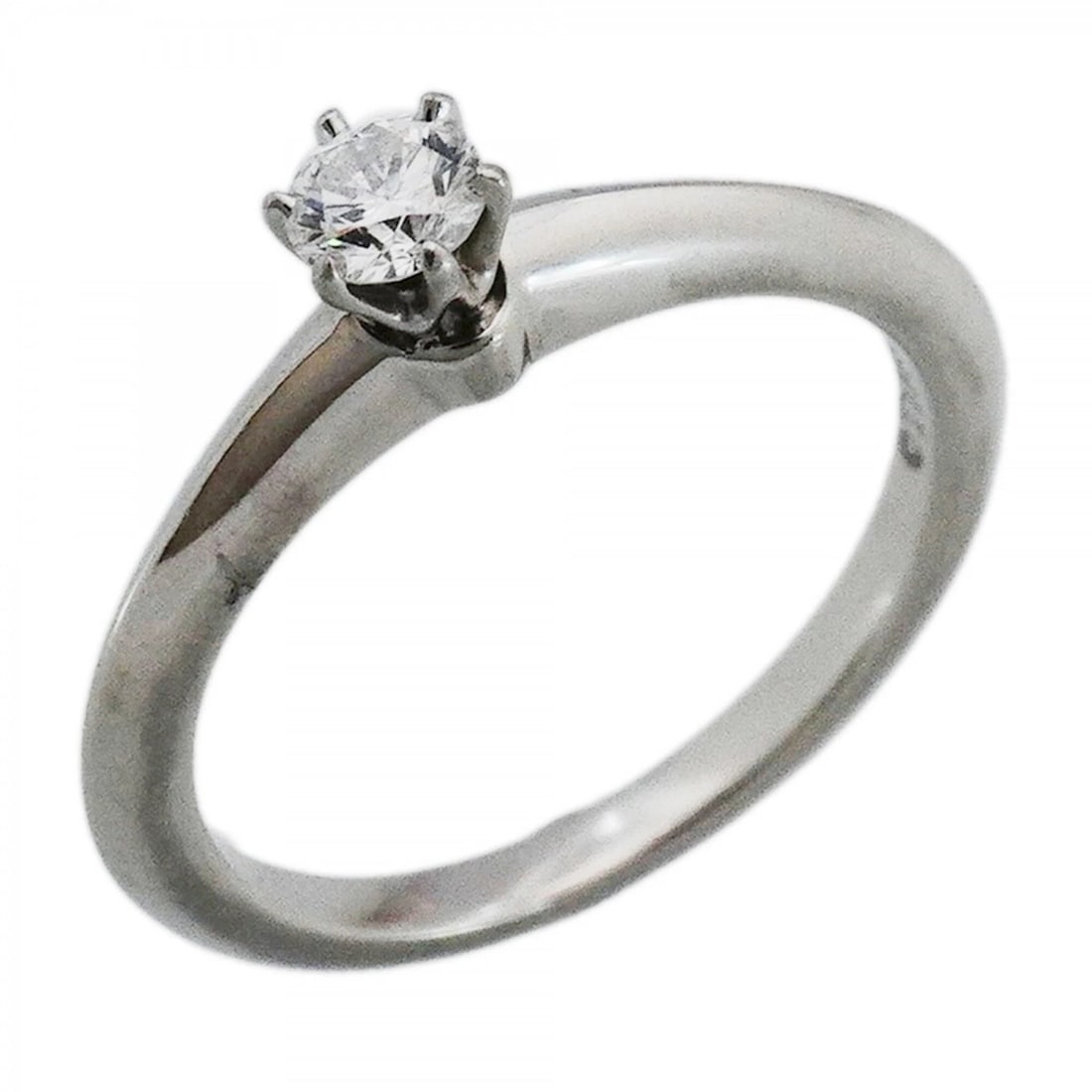 TIFFANY & CO. SOLITAIRE RING, 1PD (ONE DIAMOND): Tiffany & Co. Solitaire Ring, 1PD (One Diamond) Brand: Tiffany Type/Style: Band Ring Material: Platinum 950, Main Stone/Creation Natural Color: Platinum Size: US 5 Accessories: None Accessories