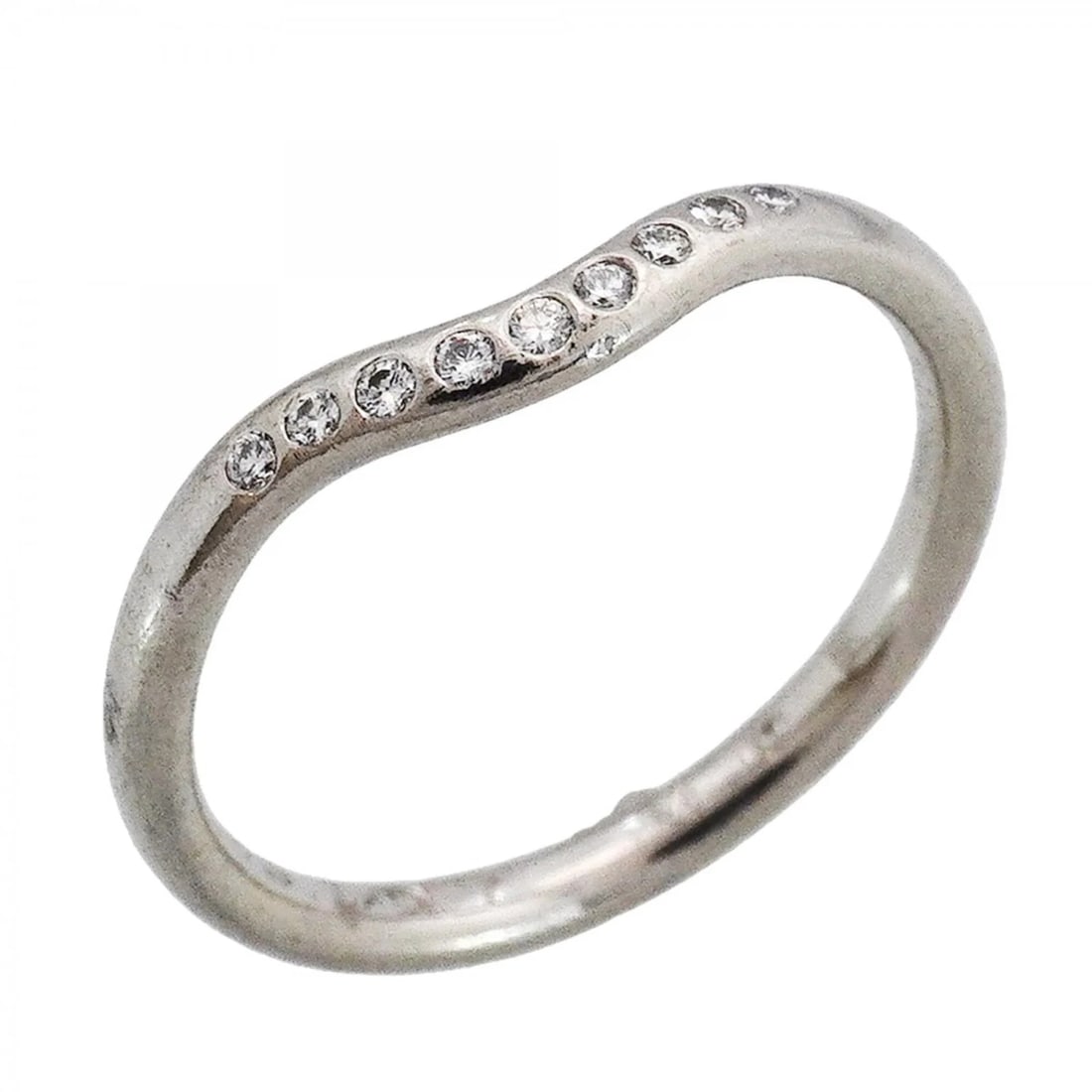 TIFFANY & CO. CURVED BAND RING, PT950 PLATINUM, DIAMOND: Tiffany & Co. Curved Band Ring, Pt950 Platinum, Diamond Brand: Tiffany Type/Style: Band Ring Material: Platinum 950, Main Stone/Creation Natural Color: Platinum Size: US 6 Accessories: None