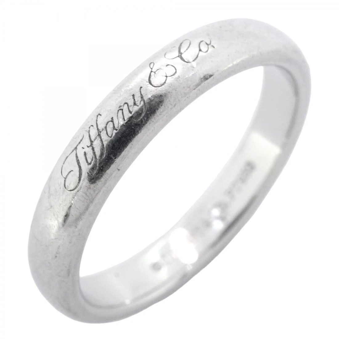 TIFFANY & CO. NOTES LUCIDA RING, PT950 PLATINUM: Tiffany & Co. Notes Lucida Ring, Pt950 Platinum Brand: Tiffany Type/Style: Band Ring Material: Platinum 950 Color: Platinum Size: US 5 Accessories: None Accessories Notice: When purchasing