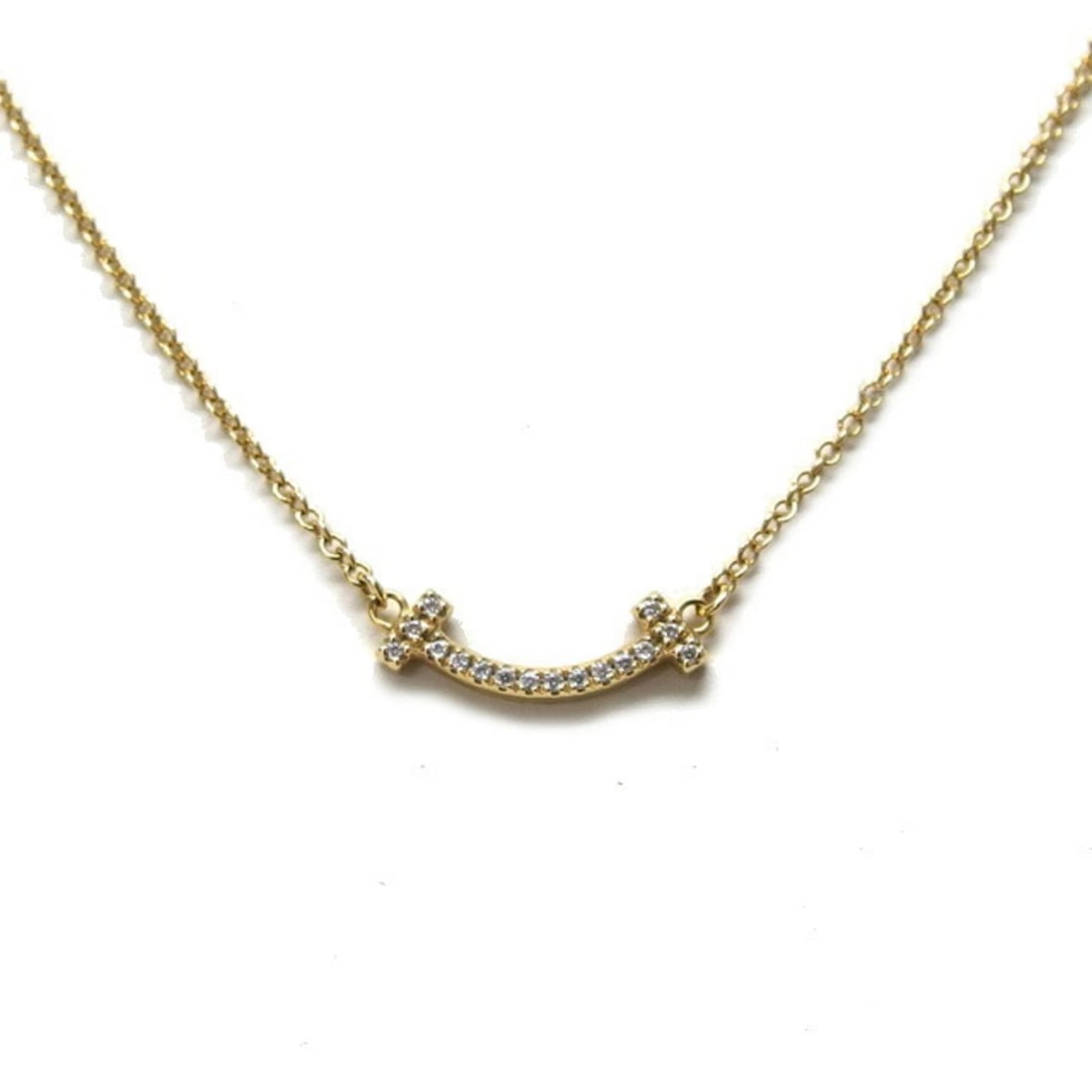 TIFFANY & CO. T SMILE PENDANT MINI, PAVE DIAMONDS: Tiffany & Co. T Smile Pendant Mini, Pave Diamonds Brand: Tiffany Type/Style: Necklace Material: Yellow gold (18K) Color: Yellow gold Size: Neck Circumference 40.5 cm - 45 cm / 15.94'' - 17.71'' Pendan