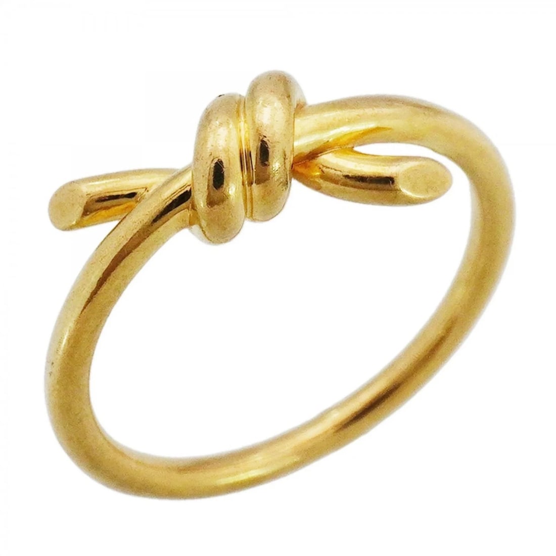 TIFFANY & CO. KNOT RING, 18K YELLOW GOLD: Tiffany & Co. Knot Ring, 18K Yellow Gold Brand: Tiffany Type/Style: Band Ring Material: Yellow gold (18K) Color: Yellow gold Size: US 4 Accessories: None Accessories Notice: When purchasin