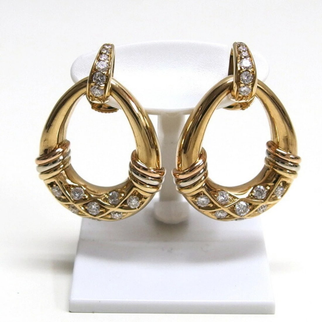 CARTIER DOOR KNOCKER MOTIF TRINITY DIAMOND EARRINGS: Cartier door knocker motif Trinity diamond earrings Brand: Cartier Type/Style: Stud earRings Material: Yellow gold (18K) Color: Yellow gold Size: Size 26.00mm x 20.00mm / 1.02'' x 0.79'' Accessories: