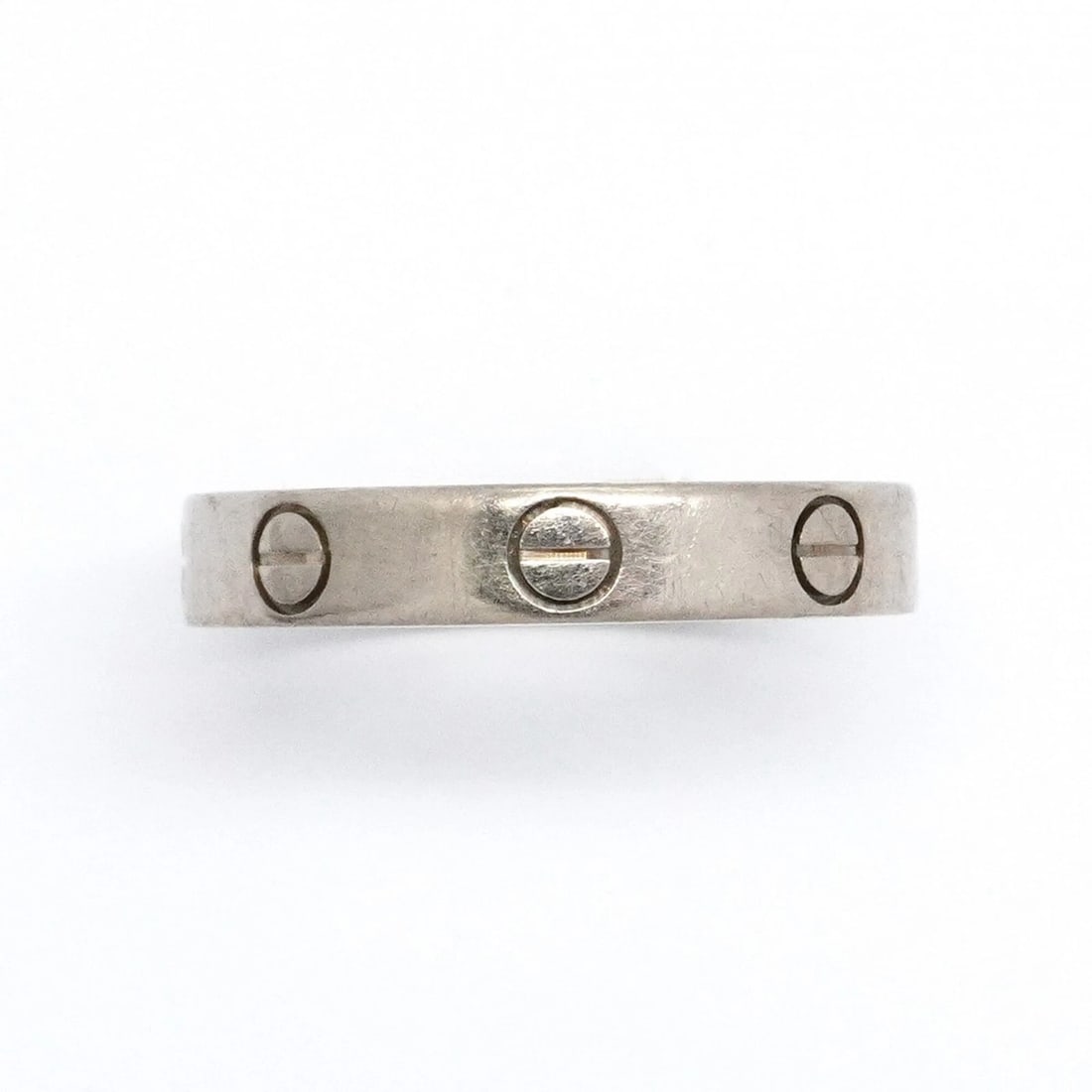 CARTIER MINI LOVE RING, 18K WHITE GOLD: Cartier Mini Love Ring, 18K White Gold Brand: Cartier Type/Style: Band Ring Material: White gold (18K) Color: White gold Size: US 7 Accessories: None Accessories Notice: When purchasing pre-owned