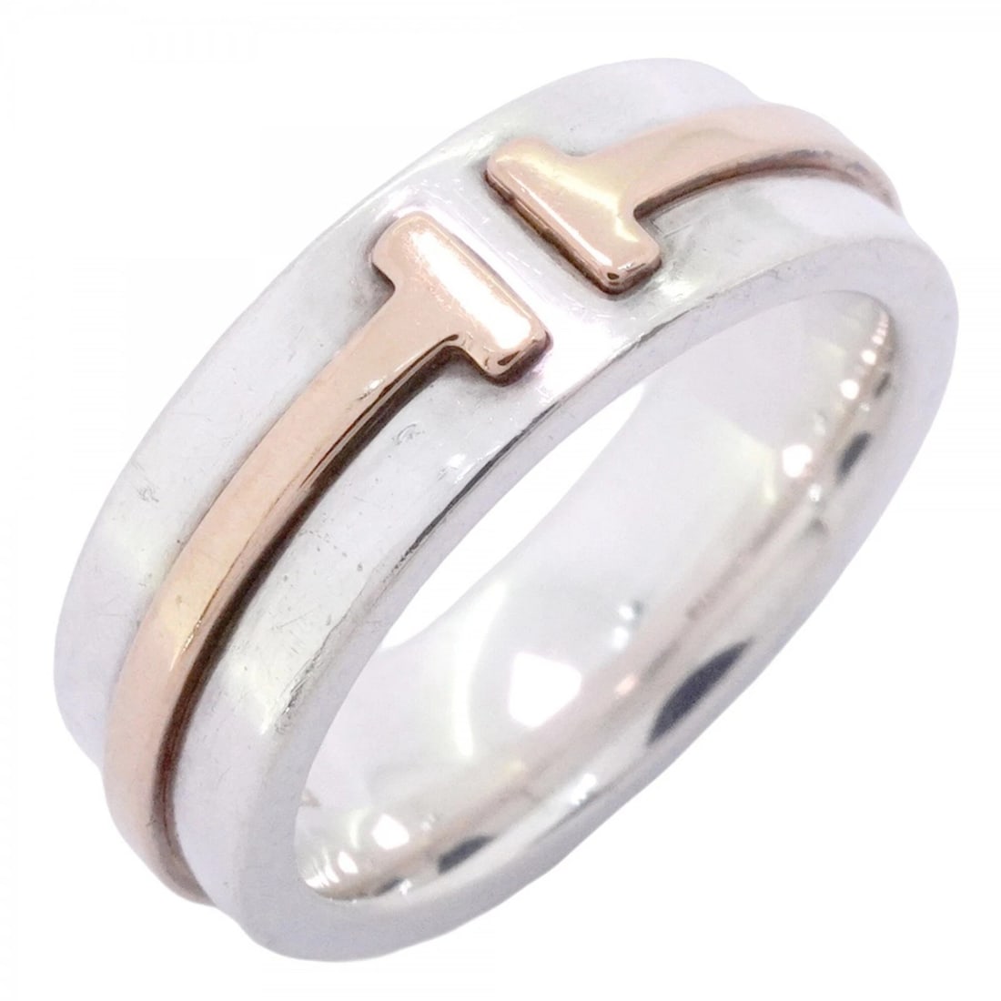 TIFFANY & CO. T NARROW RING, 18K PINK GOLD (PG): Tiffany & Co. T Narrow Ring, 18K Pink Gold (PG) Brand: Tiffany Type/Style: Band Ring Material: Pink gold (18K) Silver 925 Color: Pink gold , Silver Size: US 4 Accessories: None Accessories