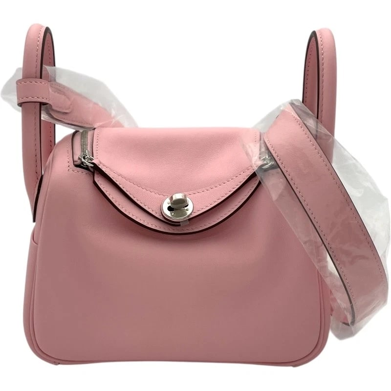 HERMES LINDY MINI SHOULDER BAG: HERMES Lindy mini Shoulder Bag Brand: HERMES Type/Style: Shoulder Bag Material: Swift Color: Rose Sakura SVHardware Size: W18cm x H13cmx D9.5cm W7.1 x H5.1x D3.7inch Accessories: None Acce