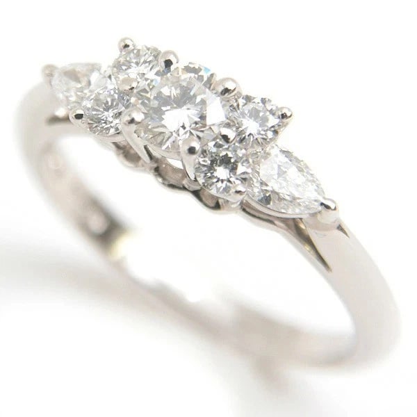 TIFFANY & CO. SEVEN-STONE DIAMOND RING: Tiffany & Co. Seven-Stone Diamond Ring Brand: Tiffany & Co. Type/Style: Ring Material: Pt950 Color: Platinum Size: US4.75 Accessories: None Accessories Notice: When purchasing pre-owned goods, please
