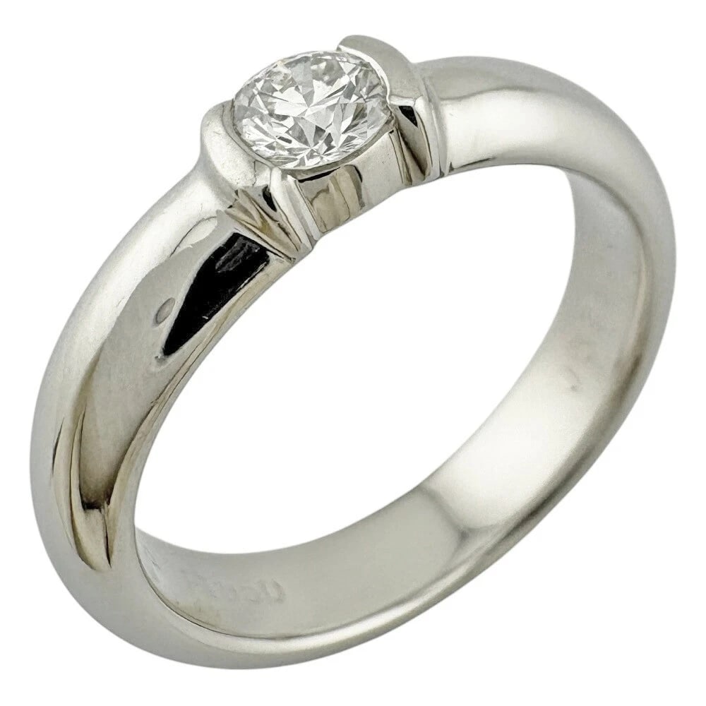 TIFFANY & CO. DOTS SOLITAIRE DIAMOND RING: Tiffany & Co. Dots Solitaire Diamond Ring Brand: Tiffany & Co. Type/Style: Ring Material: Pt950 Color: Platinum Size: US 3.75 Accessories: None Accessories Notice: When purchasing pre-owne