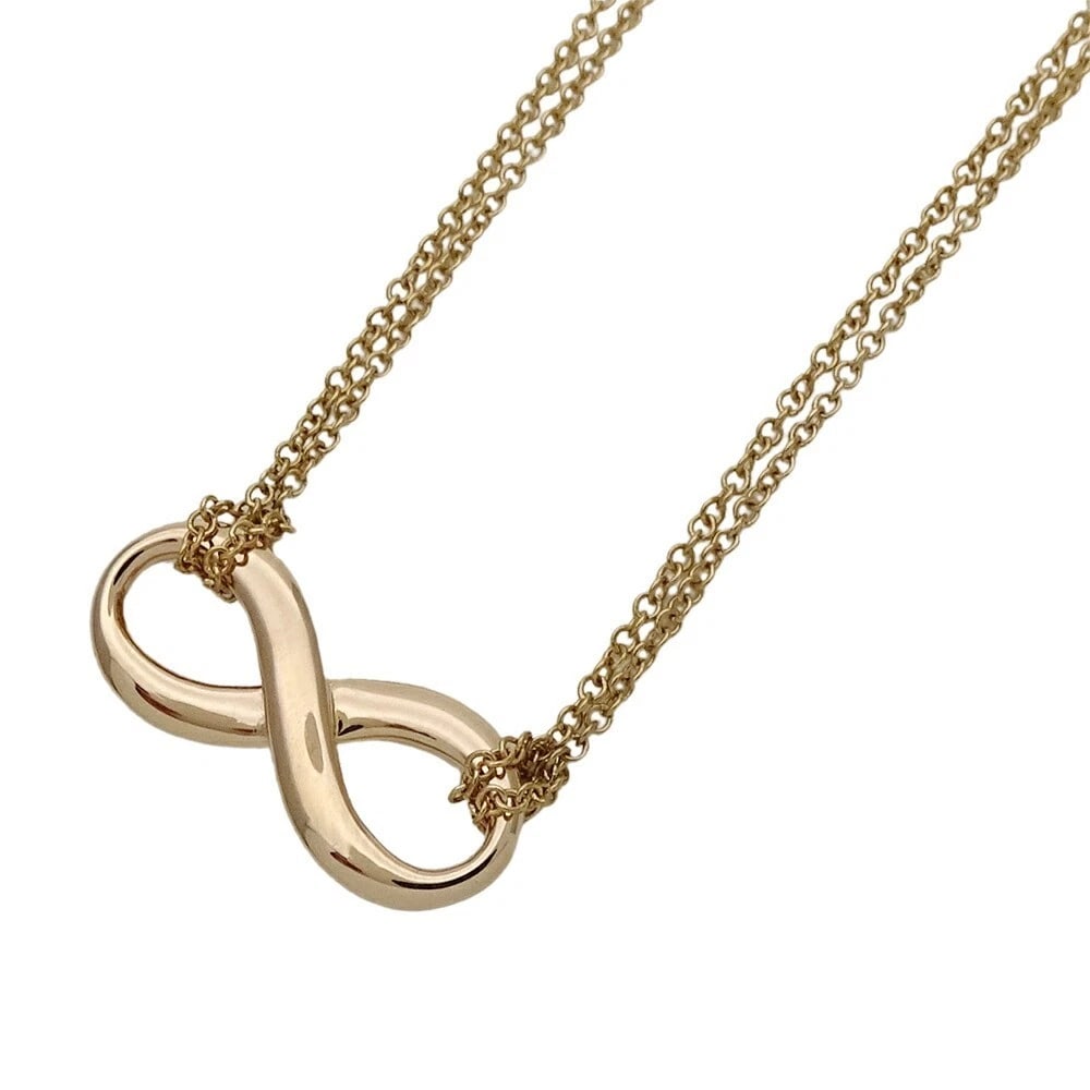 TIFFANY & CO INFINITY NECKLACE: Tiffany & Co Infinity Necklace Brand: Tiffany & Co. Type/Style: Necklace Material: 18K Rose Gold Pink Gold Color: RG PG Size: Necklace Length: Approx. 16.1 inches (41 cm) Pendant Size: Height approx.