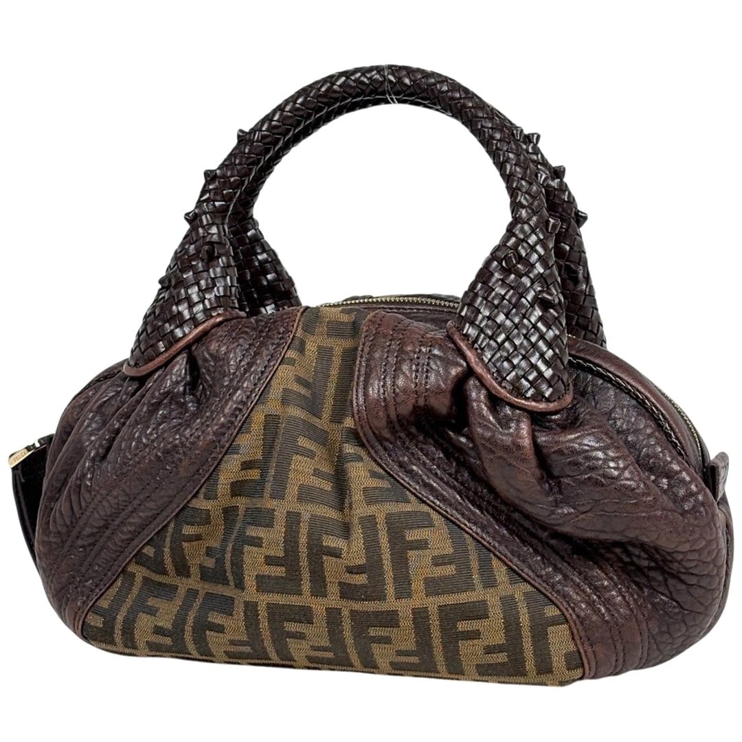 FENDI ZUCCA PATTERN MINI SPY BAG: Fendi Zucca Pattern Mini Spy Bag Brand: FENDI Type/Style: Mini Spy Bag Material: Canvas, Leather Color: Brown Size: Approximately 33 cm (13 in) width, 20 cm (7.9 in) height, 13 cm (5.1 in) depth A