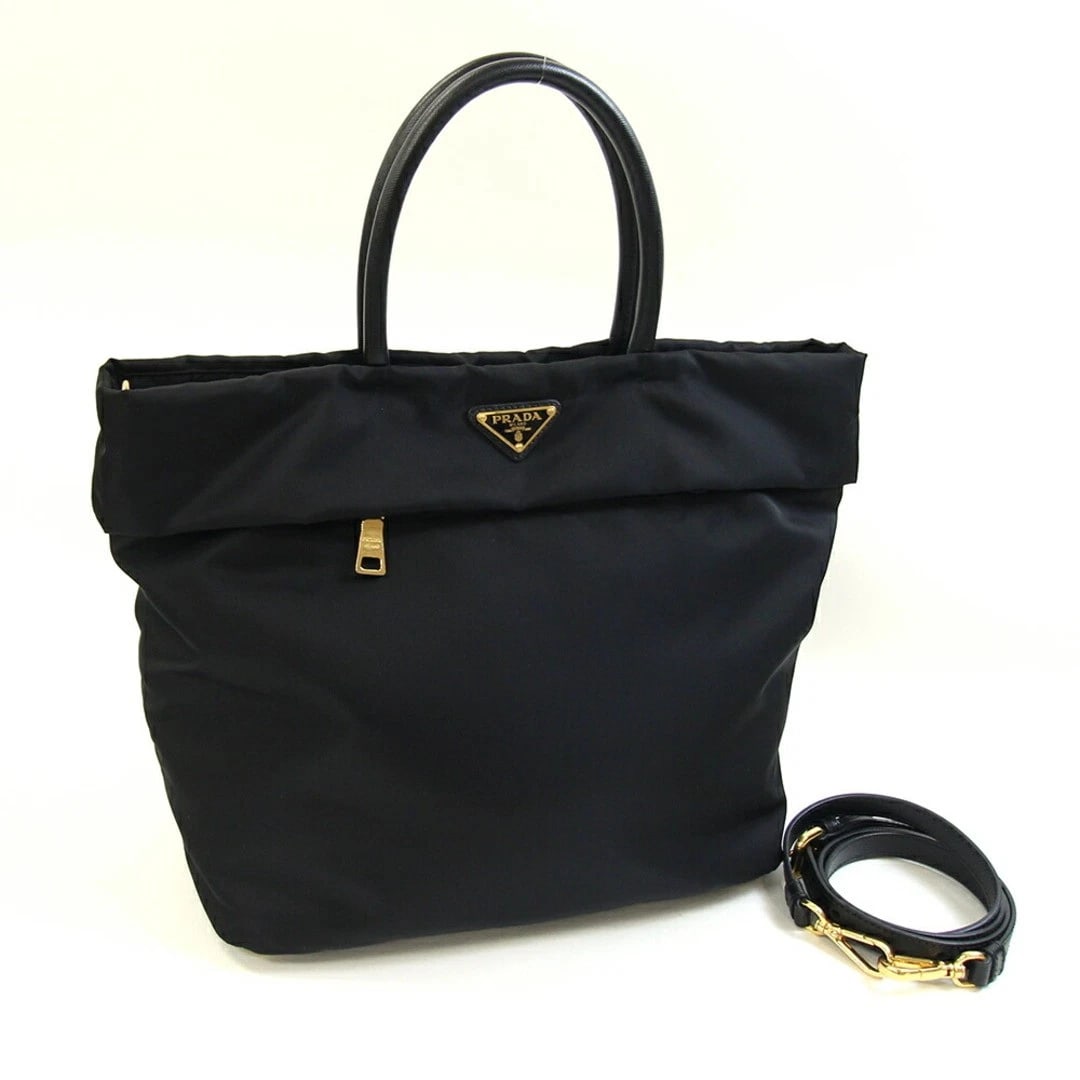 PRADA 2WAY HANDBAG BLACK NYLON LEATHER: Prada 2WAY Handbag Black Nylon Leather Brand: PRADA Type/Style: Bag Material: Nylon and Leather (Tessuto + Saffiano) Color: Black (Nero) Size: Approximately W30-39cm (11.8-15.3 in) x H27cm (10.6 in) x